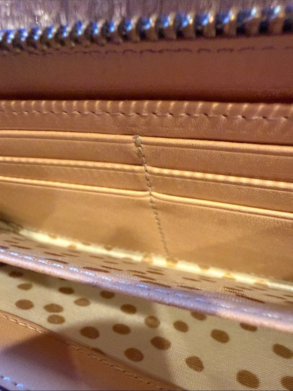 kate spade New York cobalt blue leather zip-around wallet